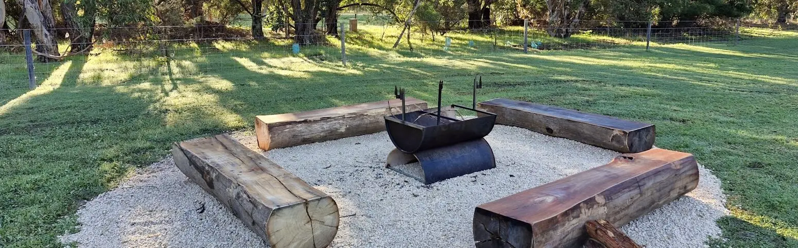 Log seating around a fire pit